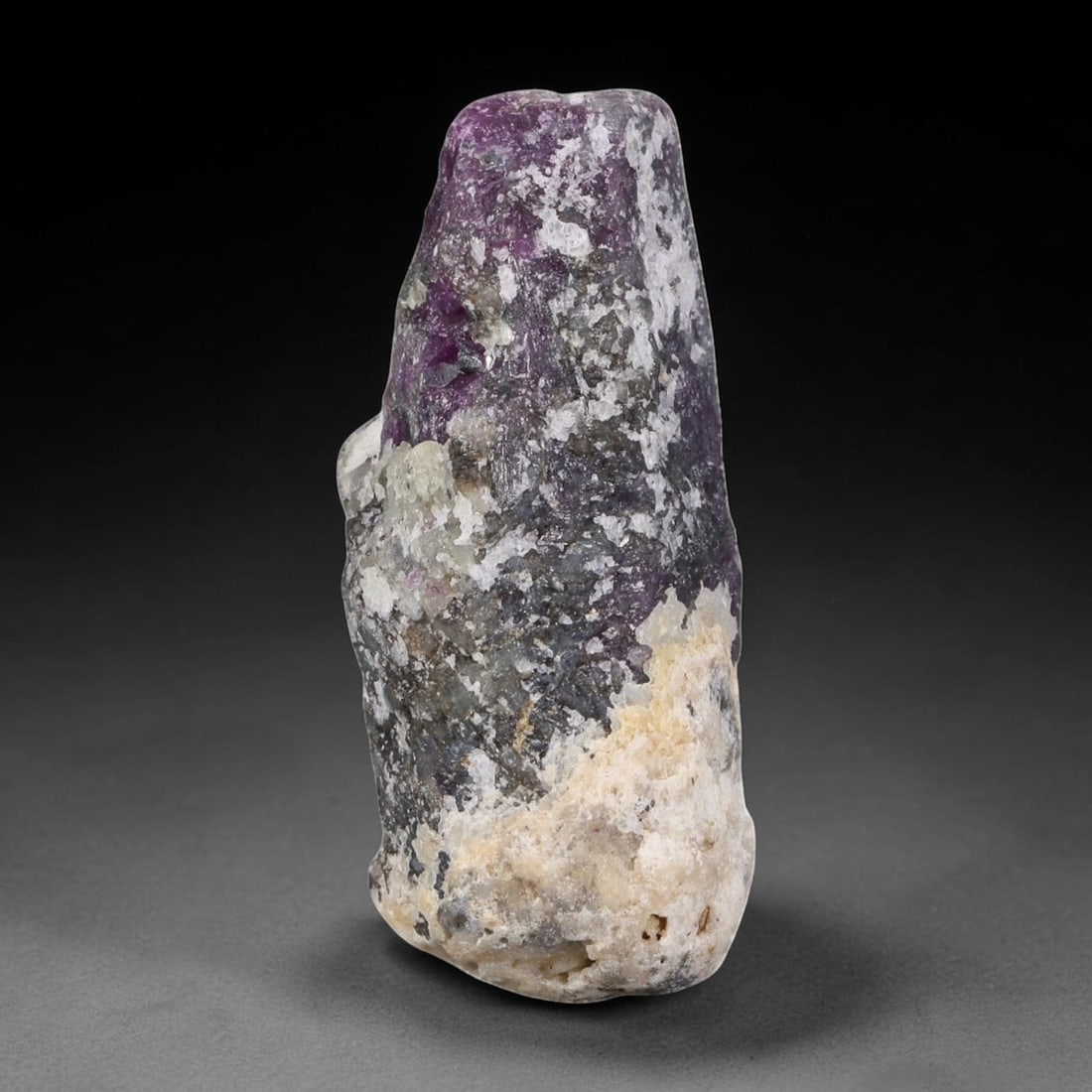 32.88ct Natural Mauritania Ruby Rough (Unheated), 53AT: Natural unheated corundum rough mined from Mauritanian gem deposits, featuring an elongated tapered crystalline form with concentrated magenta-pink ruby corundum occupying the upper tapered section, t