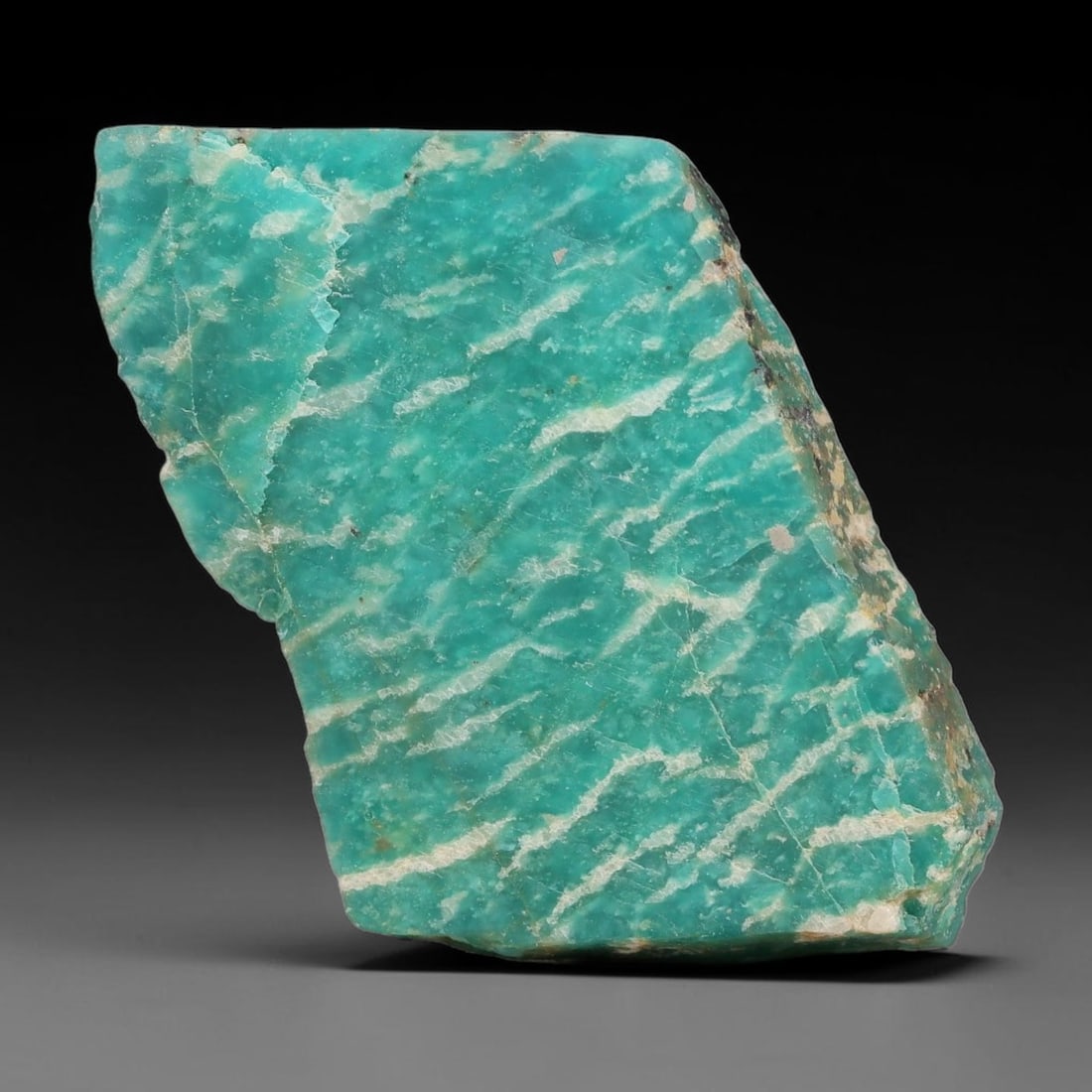 85ct Natural Russian Ural Amazonite Slab Rough, 93EB: This intact amazonite slab features distinct parallel mineral banding running uniformly across its naturally split flat surface within 38x28x7mm slab dimensions, retaining unmodified natural geologica