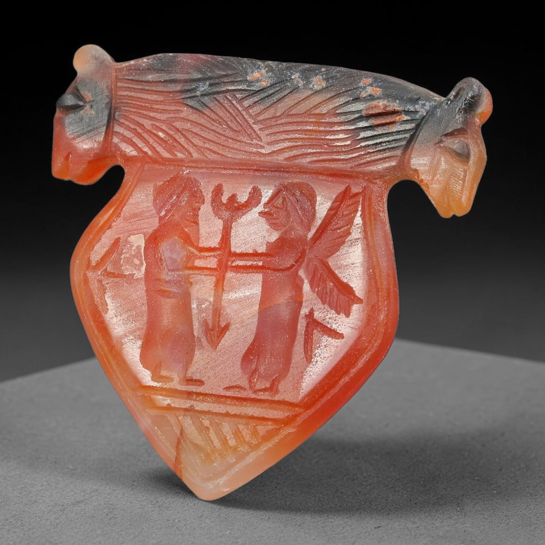 Vintage Natural Carnelian Agate Revival Indo-Persian Glyptic Figural Talisman Amulet Plaque, 37FK: This vintage talisman pendant plaque is skillfully carved from natural banded carnelian agate, crafted in a style referencing ancient Indo-Persian glyptic art traditions. The face bears detailed relie