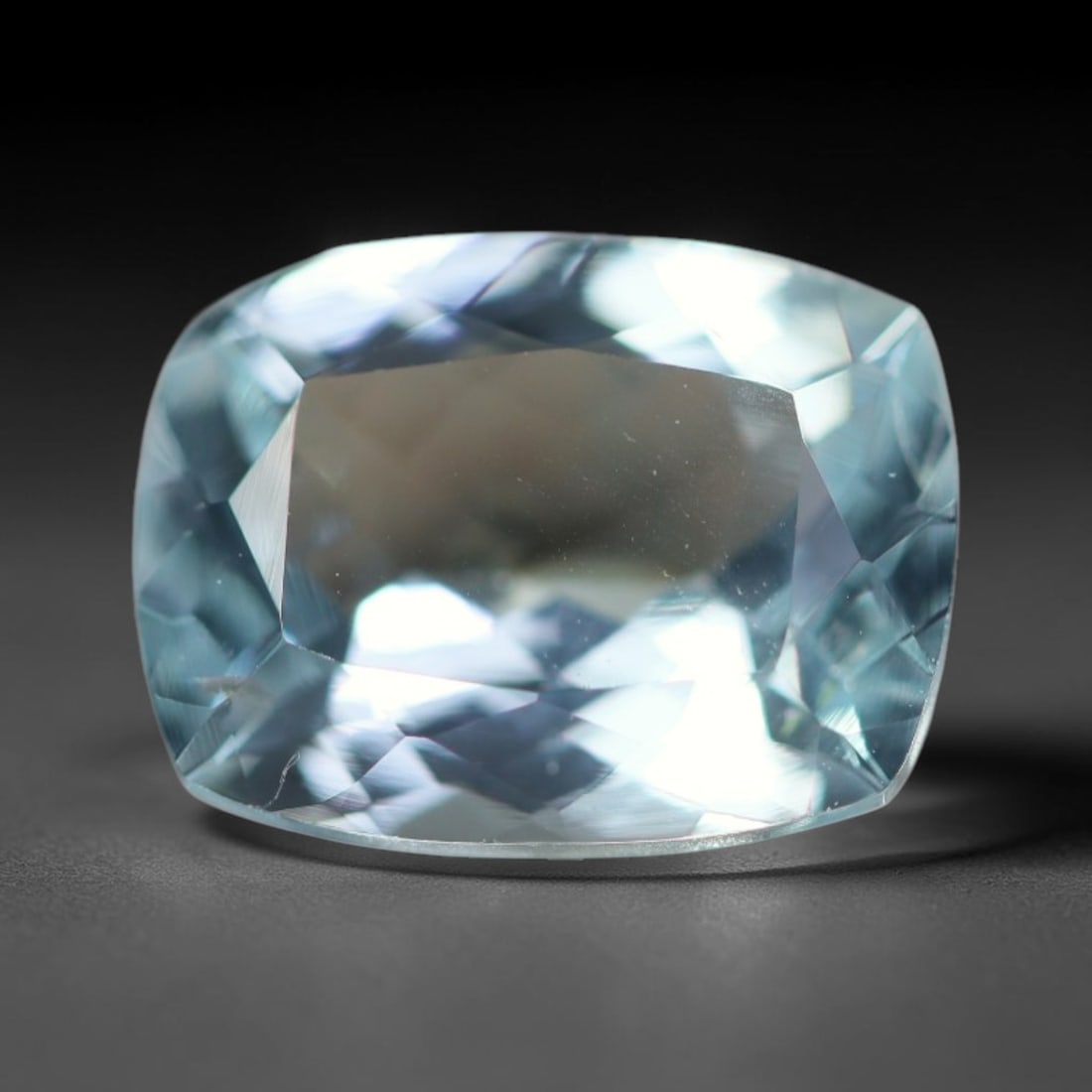 2.64ct Natural Brazilian Sky Blue Faceted Aquamarine Loose Gemstone, 18BC: This precisely faceted aquamarine boasts clear translucent pale sky blue body tone with subtle thin mineral needle and tiny scattered crystalline specks visible within its polished reflective planes i