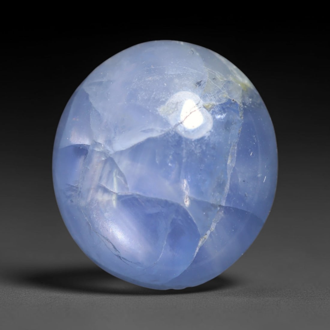 4.86ct Natural Unheated Burmese Blue Star Sapphire Oval Cabochon Loose Gemstone, 51BQ: This smoothly polished oval cabochon features natural Burmese blue star sapphire, formed with densely aligned rutile needle inclusions required to produce asterism. The gently domed surface is expertl