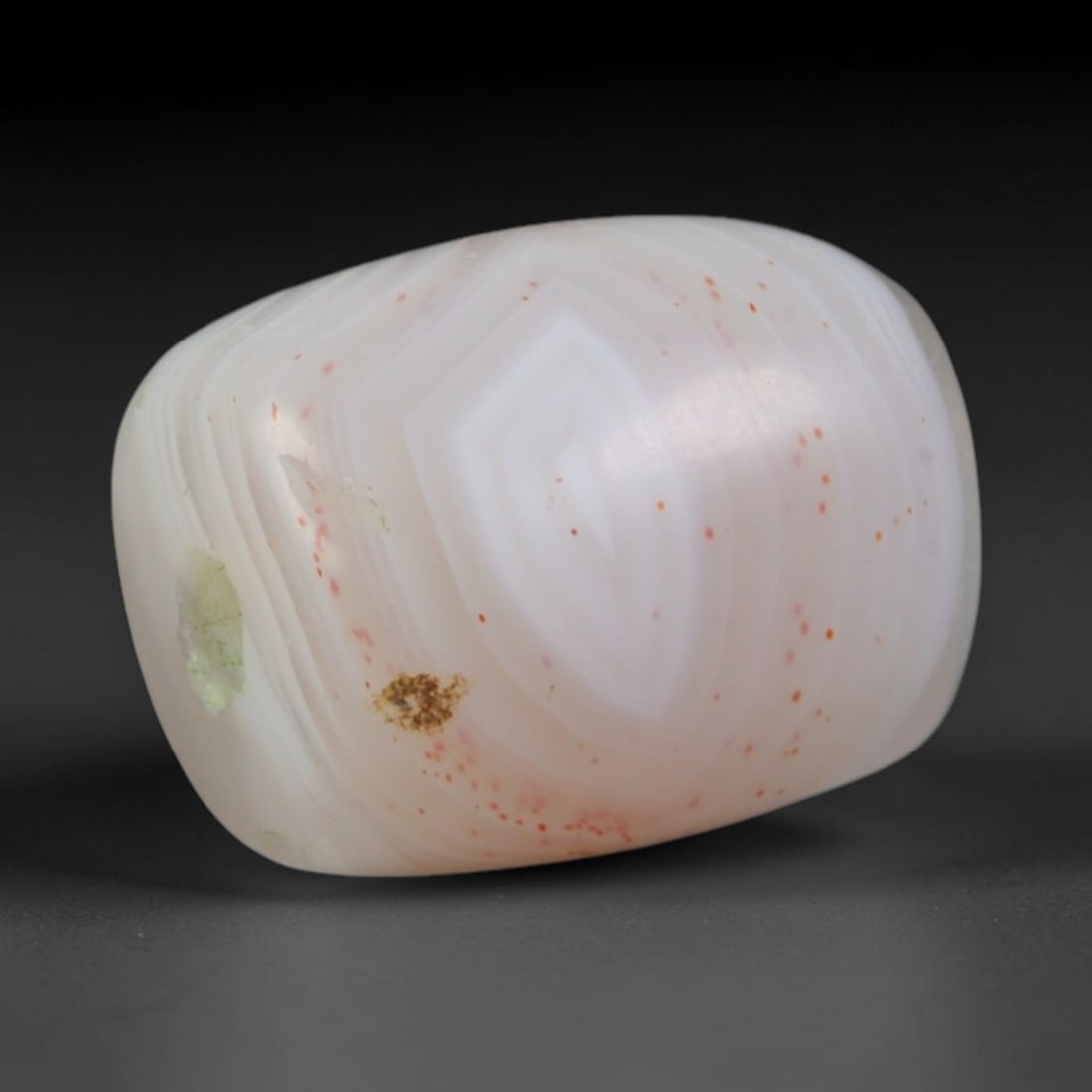 Ancient Late Roman Eastern Provinces Banded Agate Barrel Bead (100-500 CE), 3AD: This antique banded agate barrel bead originates from the Late Roman Eastern Provinces, where Near Eastern bead-making techniques were adopted to craft chalcedony ornaments for civic elites, funerary 