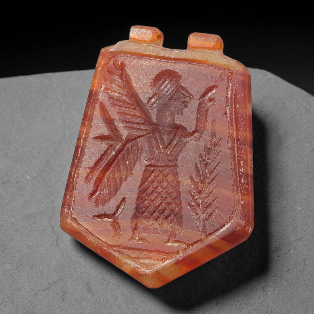 Vintage Natural Carnelian Agate Revival Indo-Persian Glyptic Figural Talisman Amulet Plaque, 11FK: This vintage talisman pendant plaque is skillfully carved from natural banded carnelian agate, crafted in a style referencing ancient Indo-Persian glyptic art traditions. The face bears detailed relie