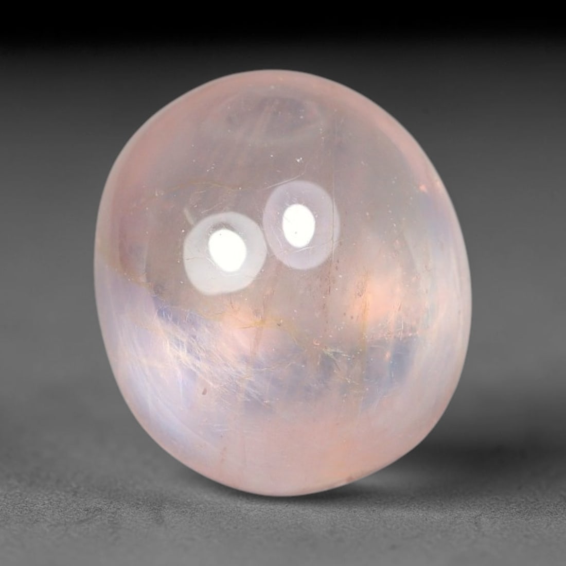 2.38ct Natural Sri Lankan Padparadscha Sapphire Loose Gemstone, 65BF: This fully polished Padparadscha sapphire features soft warm peach-orange blended body tone, with faint natural mineral traces scattered throughout its crystalline interior, measured at calibrated dim