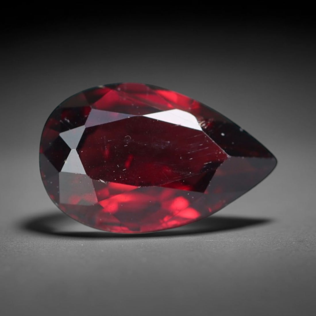 2.20ct Natural Mozambican Deep Crimson Red Faceted Almandine Garnet Loose Gemstone, 27BE: This meticulously faceted garnet features a dense, rich red crystalline body dotted with subtle micro mineral inclusions scattered evenly throughout its transparent interior, precision-cut reflective 