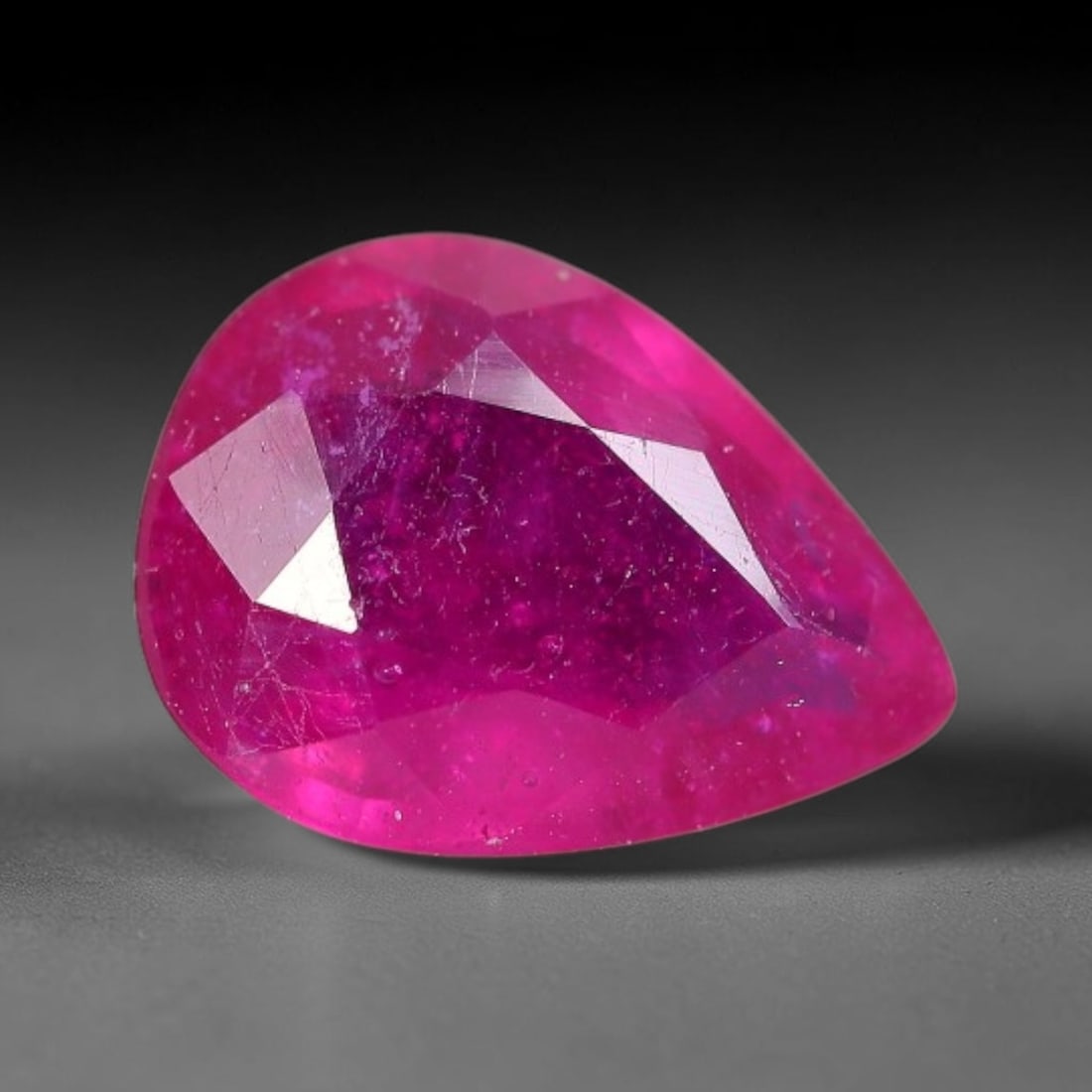 1.60 Carats Natural Madagascar Vivid Fuchsia Red Heated Ruby Loose Gemstone, 36FM: This vivid fuchsia red Madagascar ruby displays rich saturated red tone with subtle natural internal mineral traces that showcase genuine earth-grown character, measured at 8.8x6.6x3.2mm, the intense 