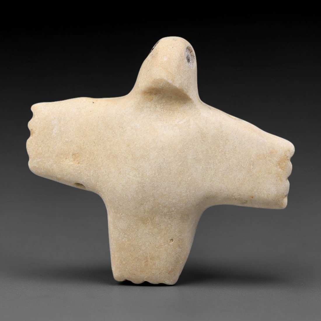 Vintage Carved Stone Anthropomorphic Bird Talisman Amulet Pendant, 100FK: This vintage wearable amulet pendant is hand-carved from pale mineral stone, shaped into a stylized anthropomorphic bird form. Pierced suspension holes allow easy threading for adornment. Crafted foll