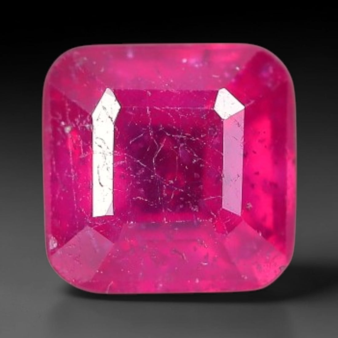 1.04 Carats Natural Madagascar Vivid Fuchsia Red Heated Ruby Loose Gemstone, 50FM: This vivid fuchsia red Madagascar ruby displays rich saturated red tone with subtle natural internal mineral traces that showcase genuine earth-grown character, measured at 5.2x3.5mm, the intense warm