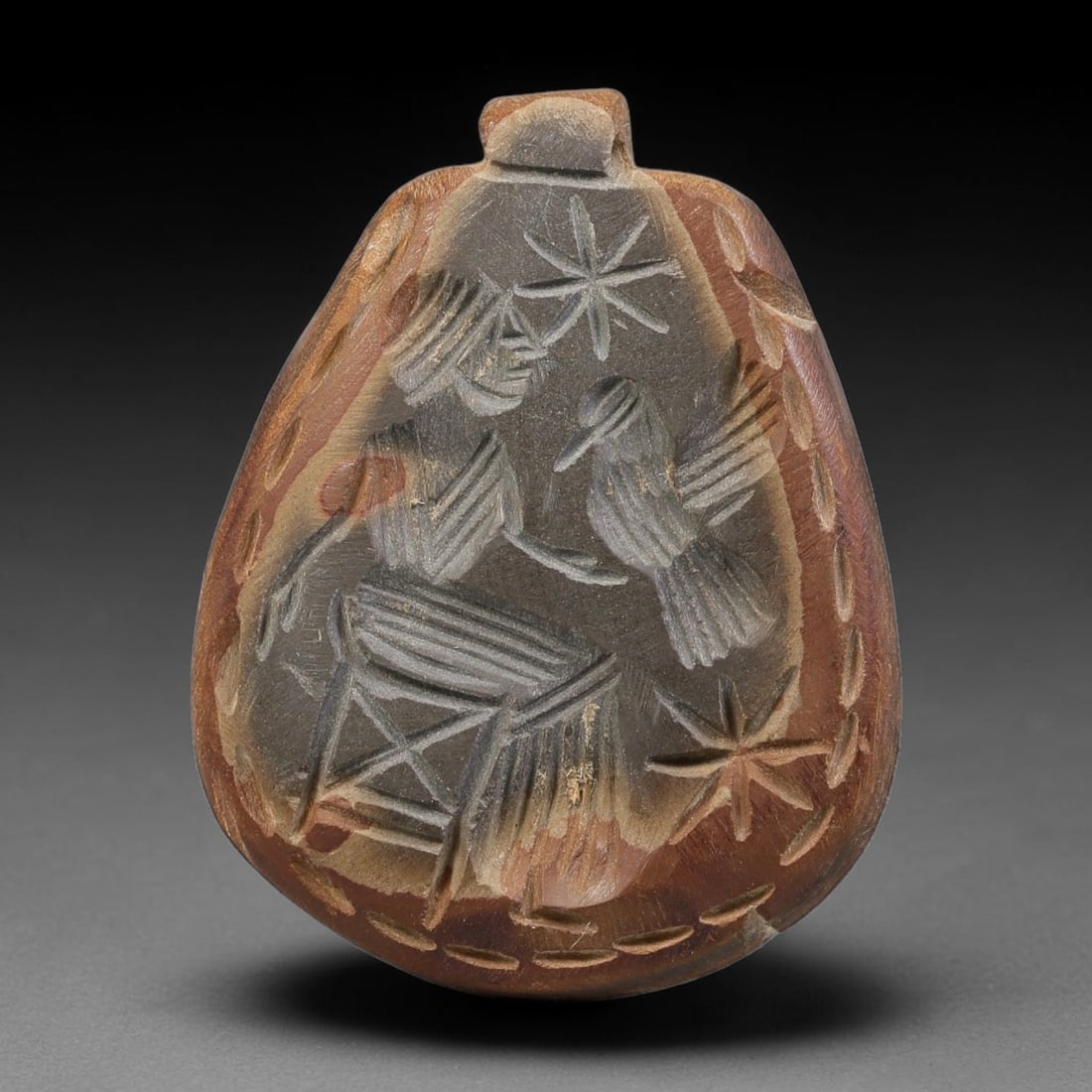 Vintage Natural Carnelian Agate Revival Indo-Persian Glyptic Figural Talisman Amulet Plaque, 5FL: This vintage talisman pendant plaque is skillfully carved from natural banded carnelian agate, crafted in a style referencing ancient Indo-Persian glyptic art traditions. The face bears detailed relie