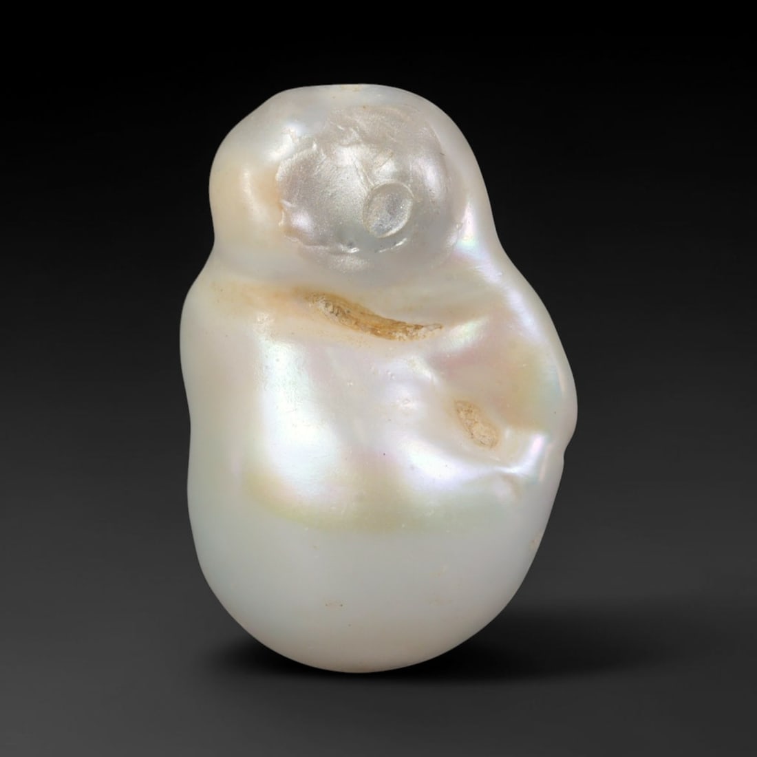 Natural Freshwater Keshi Pearl - Iridescent Baroque Pearl Ornament, 48AE: A natural freshwater keshi pearl with organic asymmetrical baroque shaping, exhibiting soft creamy blush base tones with shifting pastel pink, lavender and pale gold iridescent luster across its smoot