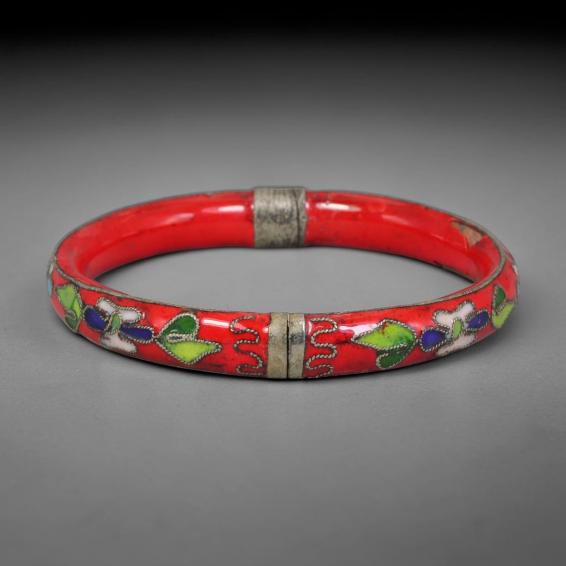 Vintage Chinese Cloisonne Bangle - Red Floral Enamel Bracelet, 73FD: Constructed with silvered metal base finished in traditional Chinese cloisonne wire filigree work, the bangle features a vibrant scarlet enamel ground inlaid with segmented floral motifs in green, dee