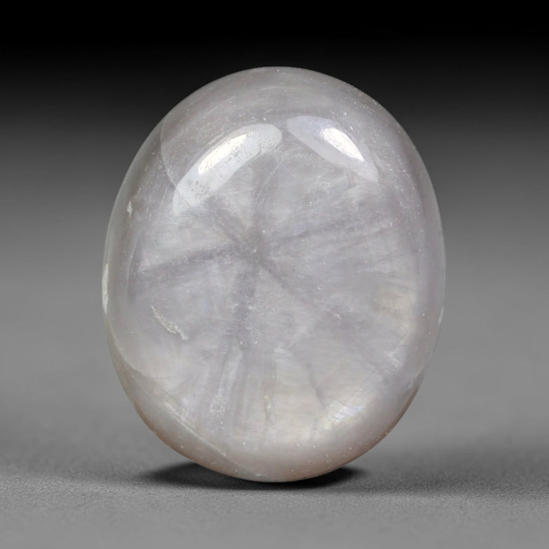 5.88ct Natural Untreated Burmese Trapiche Sapphire Loose Gemstone, 65BE: This polished Burmese trapiche sapphire features soft milky pale base tone with distinct natural mineral growth formations within its crystalline structure, measured at calibrated dimensions of 11.3x9