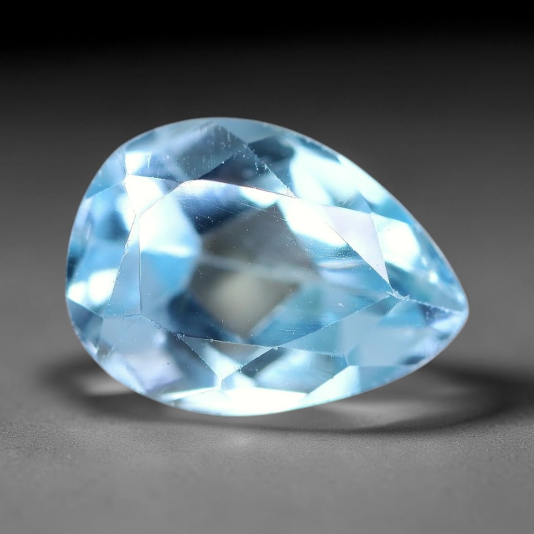 4.43ct Natural Brazilian Sky Blue Topaz Loose Gemstone, 58BE: This fully polished topaz exhibits clean bright sky-blue body tone, with faint microscopic natural crystal features visible inside its transparent structure, measured at calibrated dimensions of 11x8m