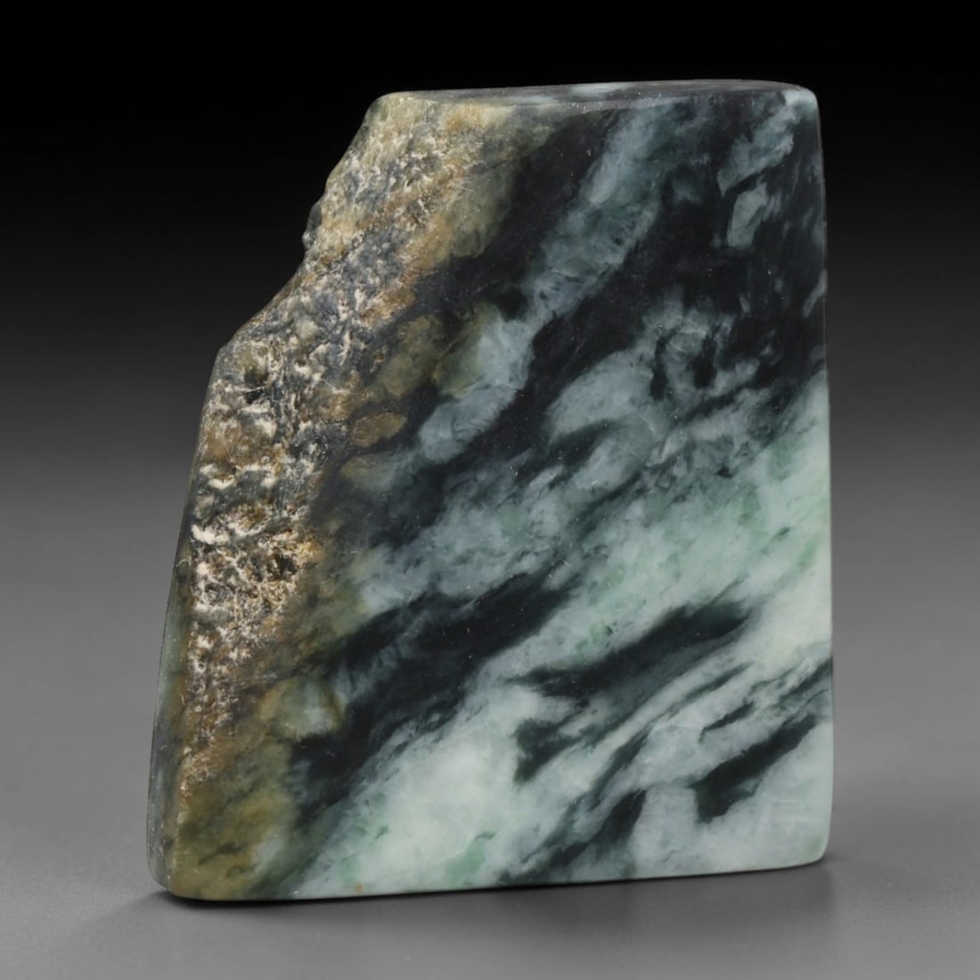 250ct Natural Type A Burmese Jadeite Jade Sliced Rough, 85EF: This specimen is a sliced rough block of natural Type A Burmese jadeite jade. The interior displays natural colour zoning with visible mineral veining and crystalline patterns typical of unprocessed j