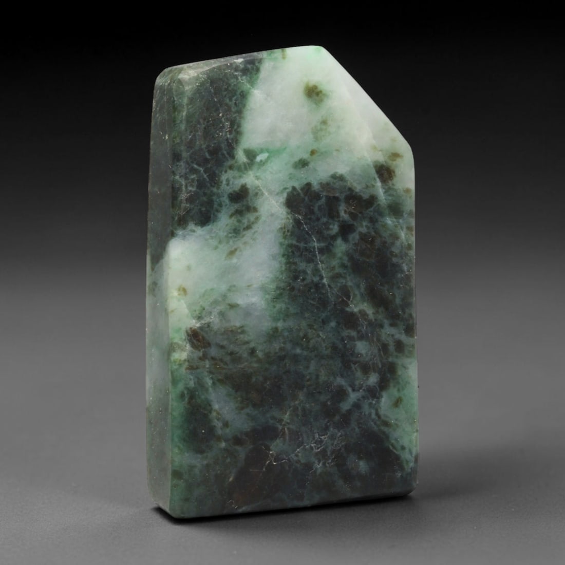 335ct Natural Type A Burmese Jadeite Jade Sliced Rough, 86EF: This specimen is a sliced rough block of natural Type A Burmese jadeite jade. The interior displays natural colour zoning with visible mineral veining and crystalline patterns typical of unprocessed j