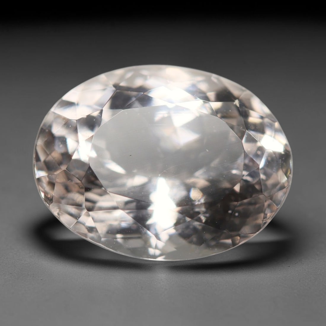 3.88ct Natural Brazilian Morganite Pear Faceted Loose Gemstone, 77BZ: This elegantly shaped pear faceted gemstone is natural morganite sourced from Brazil. It carries a soft pale pastel pink tone within its transparent crystal matrix, with precisely crafted facets that 