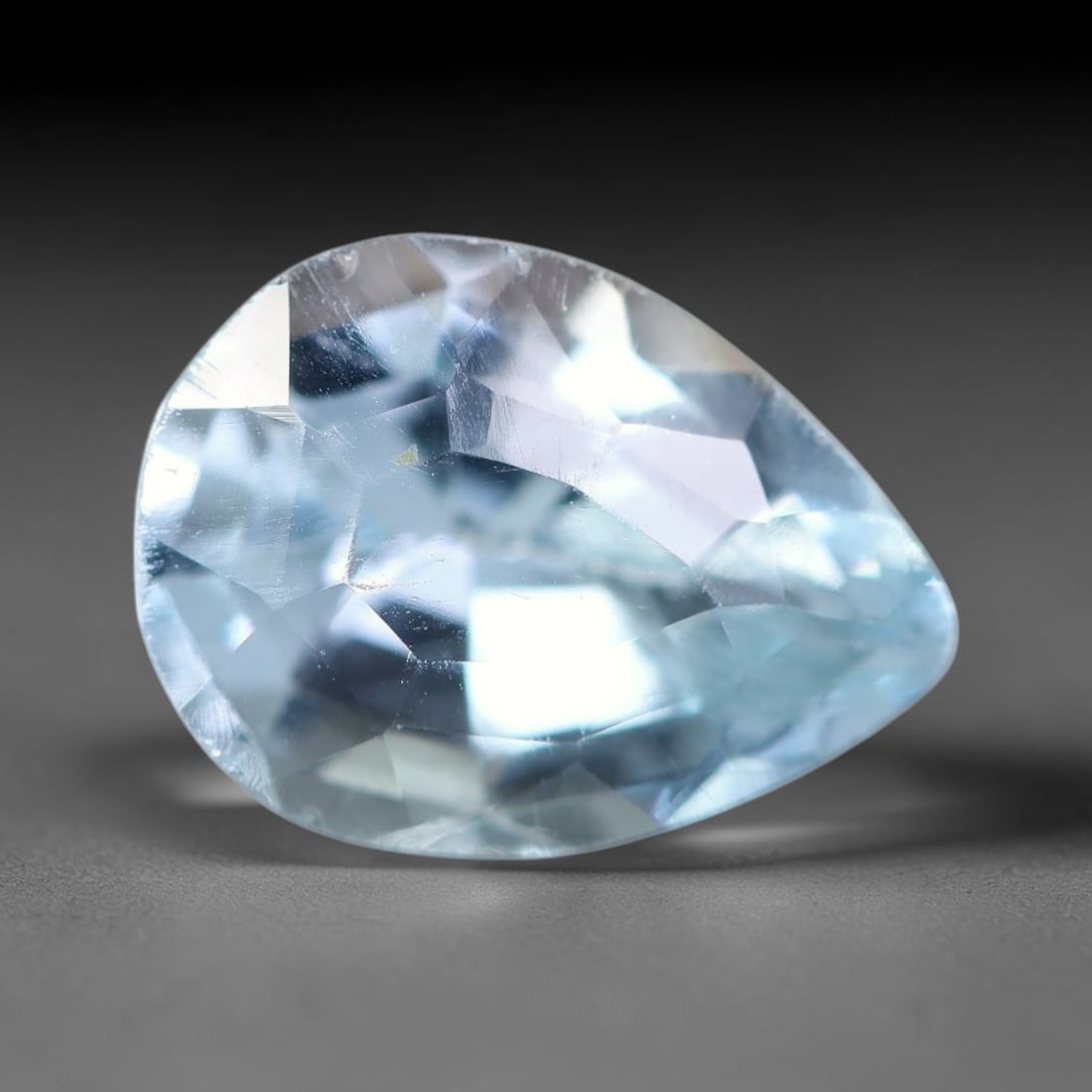 3.64ct Natural Brazilian Sky Blue Topaz Loose Gemstone, 53BE: This fully polished topaz exhibits clean bright sky-blue body tone, with faint microscopic natural crystal features visible inside its transparent structure, measured at calibrated dimensions of 11x8.