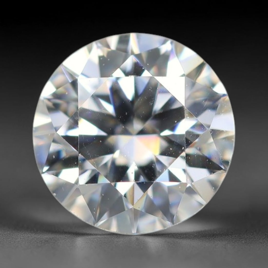 0.98 Carats Natural Clear White Moissanite Loose Gemstone, 4FL: This clear white moissanite carries dimension specs of 6.4x4mm, exhibiting outstanding light dispersion that produces vivid, multi-faceted sparkle across its transparent body, with sparse tiny micro i
