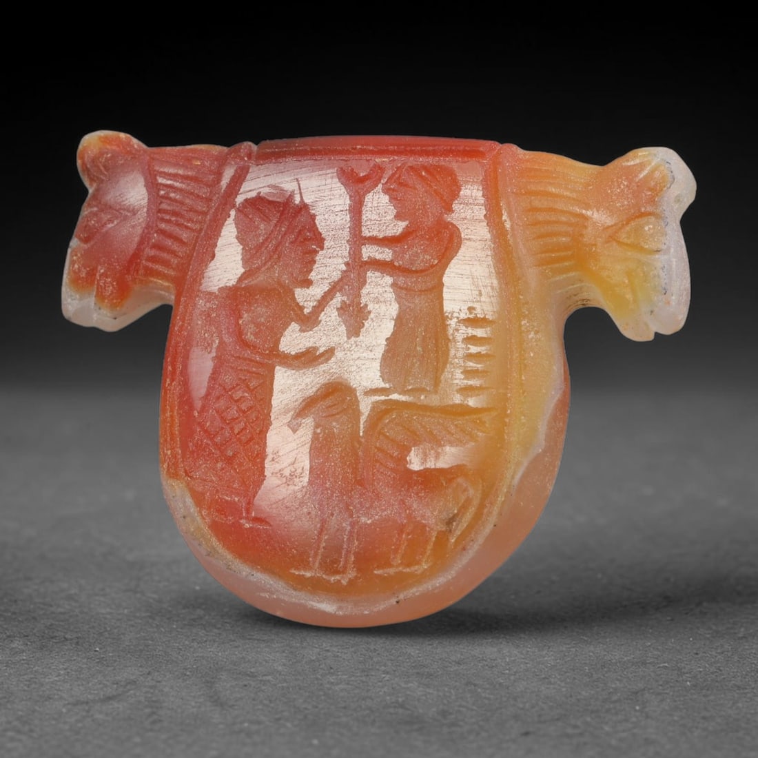 Vintage Natural Carnelian Agate Revival Indo-Persian Glyptic Figural Talisman Amulet Plaque, 98FK: This vintage talisman pendant plaque is skillfully carved from natural banded carnelian agate, crafted in a style referencing ancient Indo-Persian glyptic art traditions. The face bears detailed relie