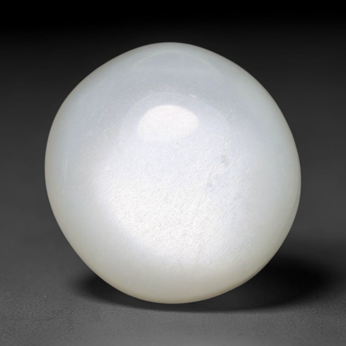 15.00ct Natural Ceylon White Moonstone Cabochon Loose Gemstone, 1FY: This natural Ceylon moonstone cabochon carries a milky white body showcasing classic adularescence. Fine mineral inclusions are visible within the gem. Dimensions measure 16x15x7mm, mined in Sri Lanka