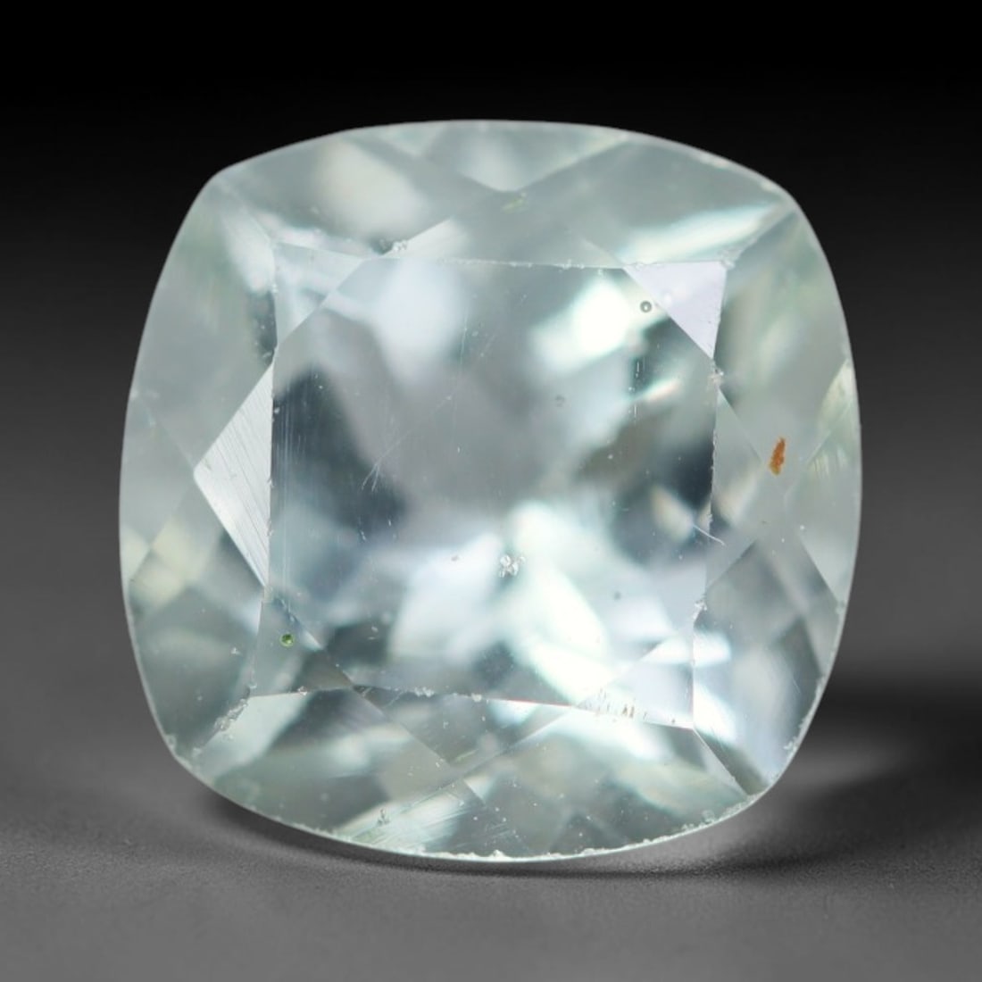 2.62ct Natural Brazilian Sky Blue Faceted Aquamarine Loose Gemstone, 96BD: This precisely faceted aquamarine boasts clear translucent pale sky blue body tone with subtle thin mineral needle and tiny scattered crystalline specks visible within its polished reflective planes i