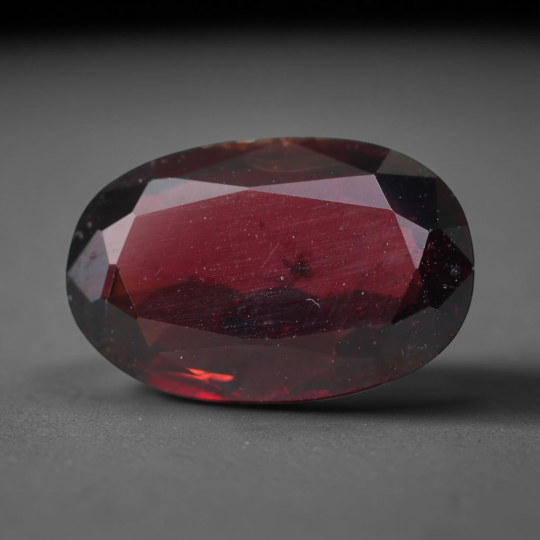 4.90ct Natural Mozambican Deep Crimson Red Faceted Almandine Garnet Loose Gemstone, 94BC: This meticulously faceted garnet features a dense, rich red crystalline body dotted with subtle micro mineral inclusions scattered evenly throughout its transparent interior, precision-cut reflective 