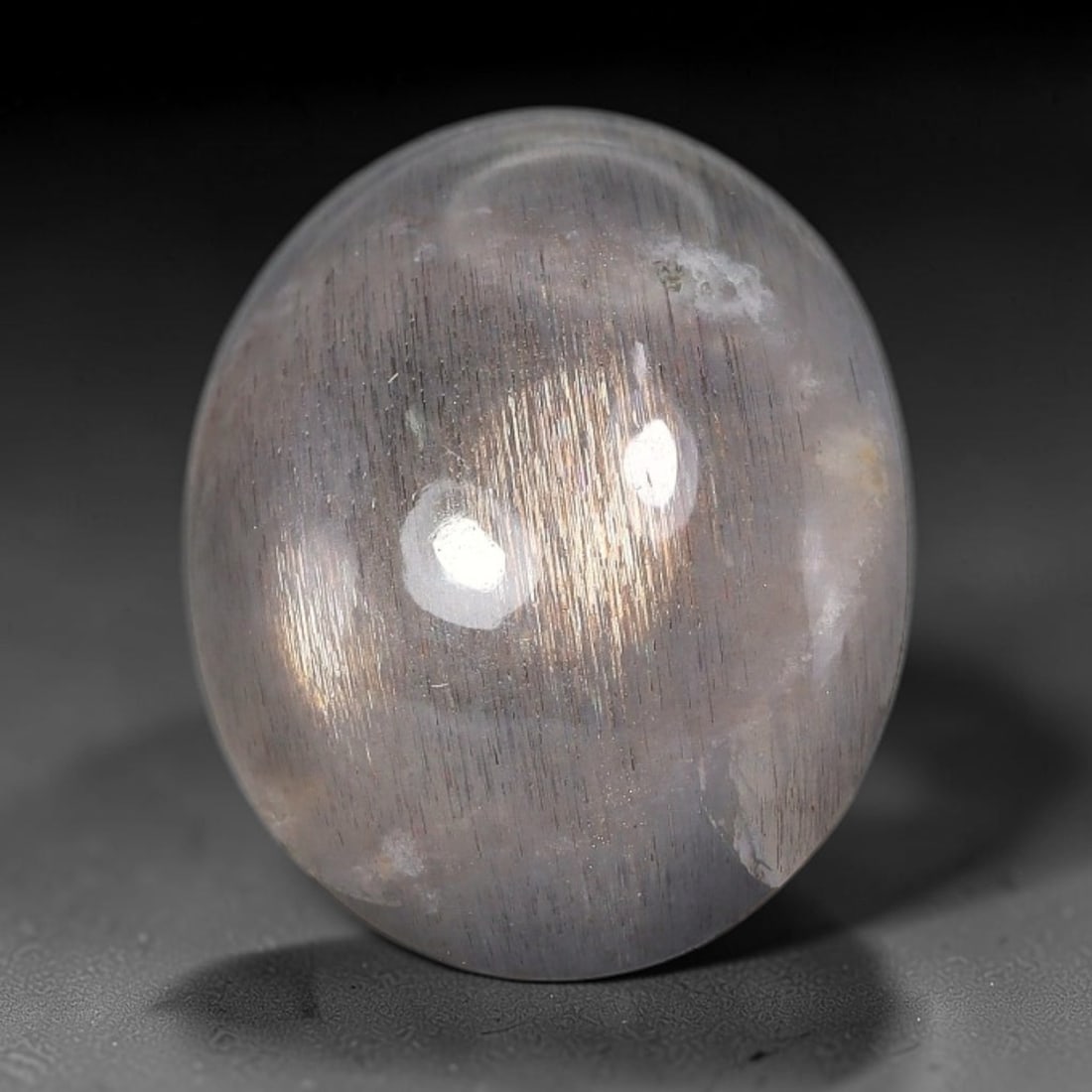 8.83 Carats Natural Australian Lattice Sunstone Cabochon Loose Gemstone, 5AG: This rich lattice sunstone boasts striking vertical mineral lattice inclusions, measured at 15.2x12.6x6.4mm, its earthy blended brown and peach base paired with vibrant multi-colored light reflections