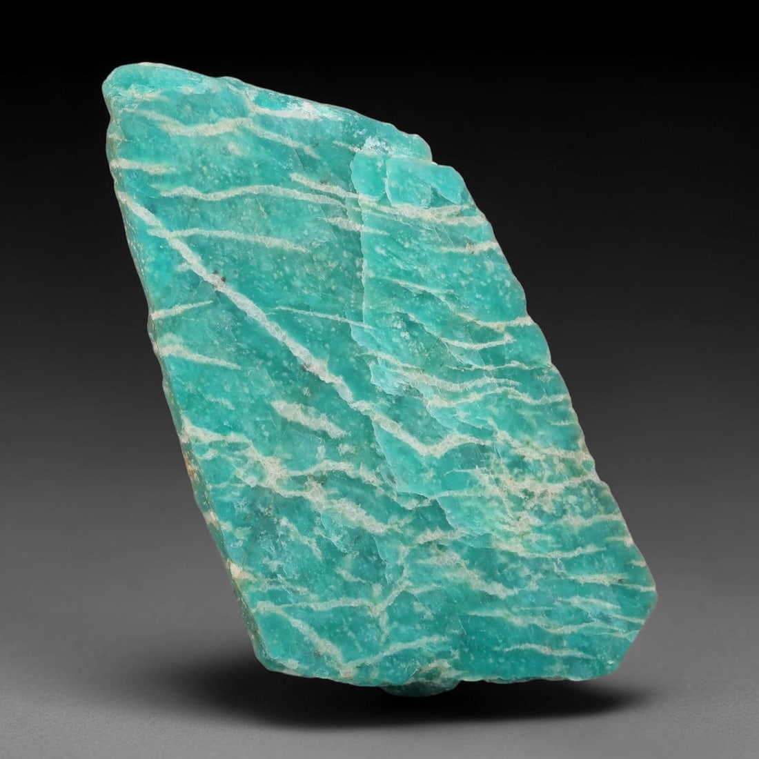 90ct Natural Russian Ural Amazonite Slab Rough, 91EB: This intact amazonite slab features distinct parallel mineral banding running uniformly across its naturally split flat surface within 52x30x6mm slab dimensions, retaining unmodified natural geologica