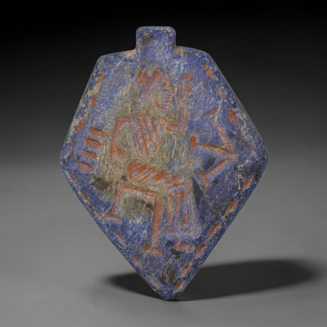 Ancient Sasanian Lapis Lazuli Hand Carved Amulet, 69AP: Antique wearable protective amulet fully carved from solid natural lapis lazuli stone, originating from the historic Sasanian Empire cultural sphere. Lapis lazuli was an immensely valued sacred stone 