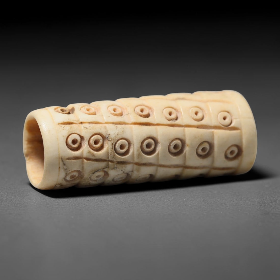Antique Sino-Siberian Steppe Nomadic Craft Stag Antler Carved Cylinder Bead (Post 1850s), 71FV: Single bead carved from natural stag antler, originating from Sino-Siberian Steppe Nomadic craft traditions, post 1850s. Measuring 4x1cm, the piece features detailed surface carving and carries warm n