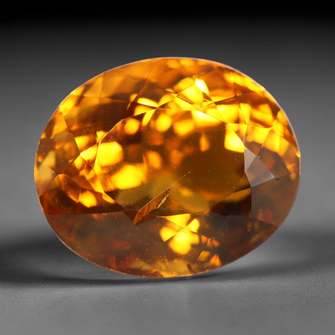 8.96ct Natural Brazilian Madeira Citrine Oval Faceted Loose Gemstone, 96BZ: This expertly cut oval faceted gemstone is natural Madeira citrine sourced from Brazil. It exhibits rich, saturated deep golden-orange tone characteristic of premium Madeira citrine, with crisp facets