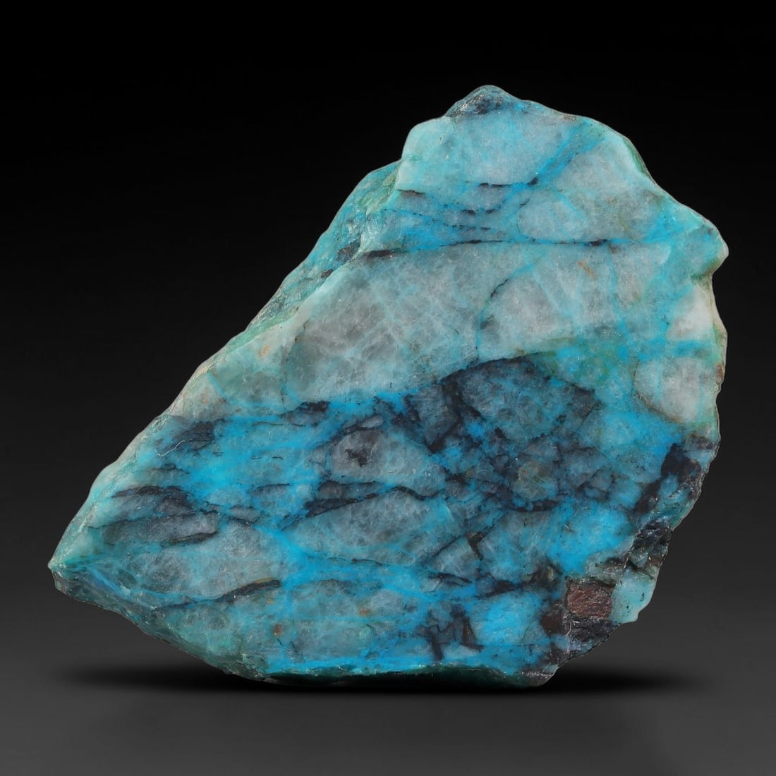 160ct Natural Peruvian Chrysocolla Polished Slab Rough, 64AR: This partial-polished chrysocolla slab features blended mineral matrix with smooth refined face and unaltered natural rugged edge across its 56x40x11mm elongated form, translucent mineral layers hold 