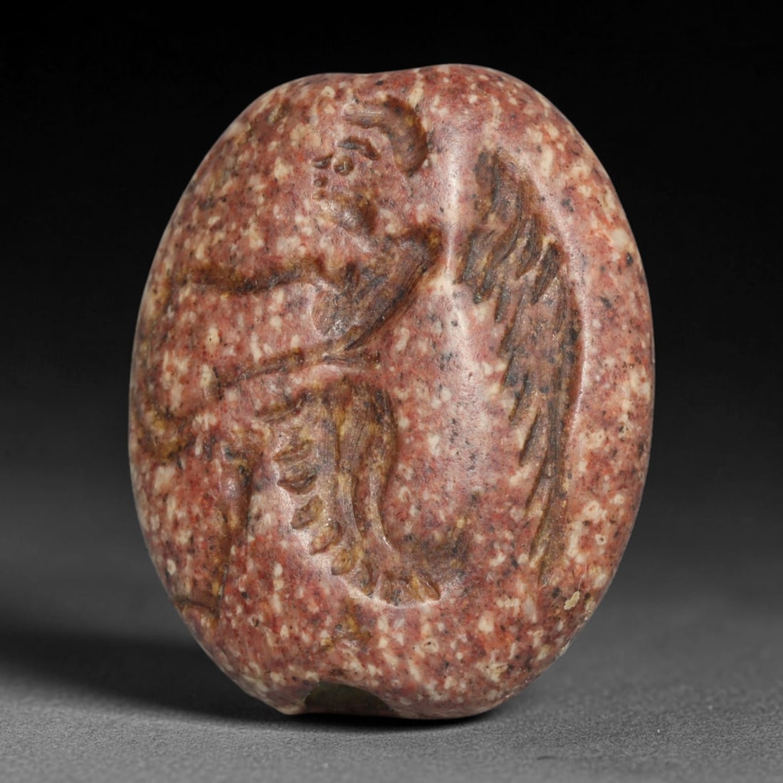 Ancient Sasanian Persian Intaglio Bead (224-651 CE), 93EC: This antique intaglio bead originates from the Sasanian Persian Empire, well known for carved stone beads fashioned as wearable protective talismans and personal insignia throughout late antiquity. Th
