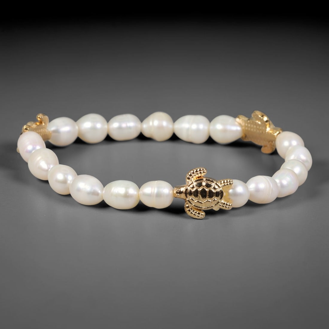 Natural Freshwater Pearl Stretch Bracelet with Crystal Spacers, 95FV: Elegant stretch bracelet crafted from natural freshwater pearls measuring 7mm, complemented by polished silver-toned crystal spacer beads. Smooth pearls display subtle organic luster, assembled on fle