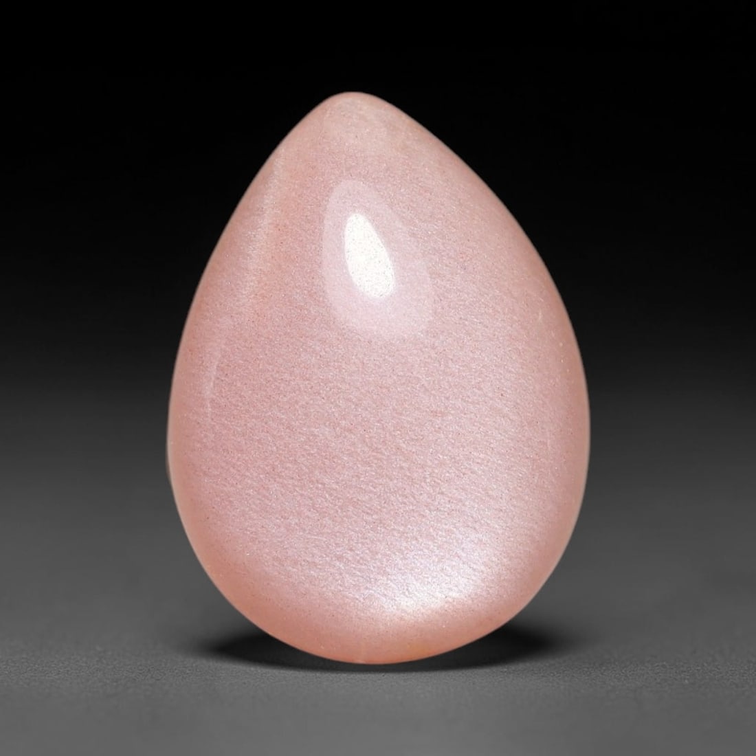 6.61ct Natural Ceylon Warm Peach Moonstone Loose Gemstone, 87FX: This natural Ceylon moonstone has dimension measurements of 15x11x5mm, showcasing a smooth warm peach base tone paired with subtle soft adularescent sheen that glides gently across the polished surfac