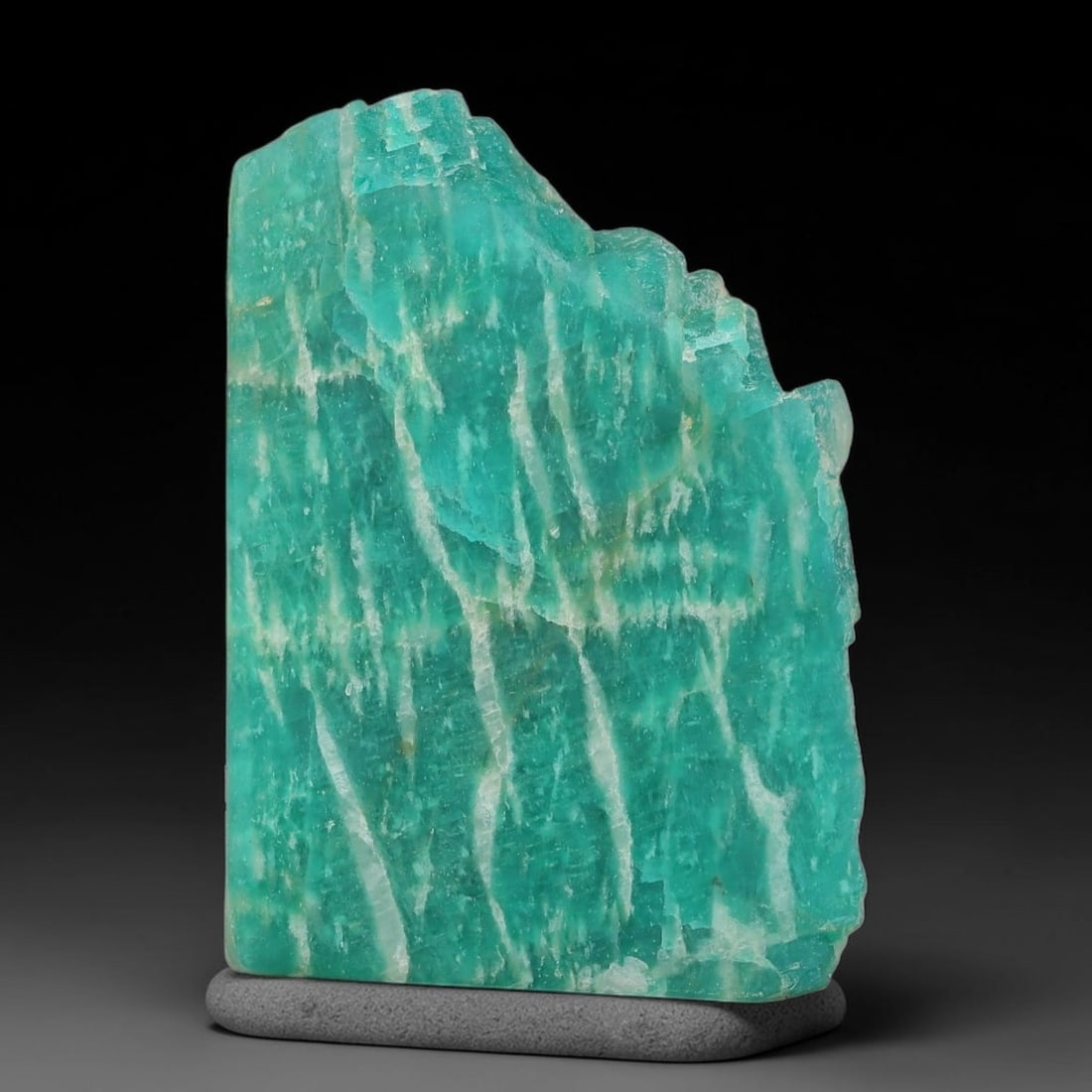 70ct Natural Russian Ural Amazonite Slab Rough, 83EB: This intact amazonite slab features distinct parallel mineral banding running uniformly across its naturally split flat surface within 33x23x9mm slab dimensions, retaining unmodified natural geologica