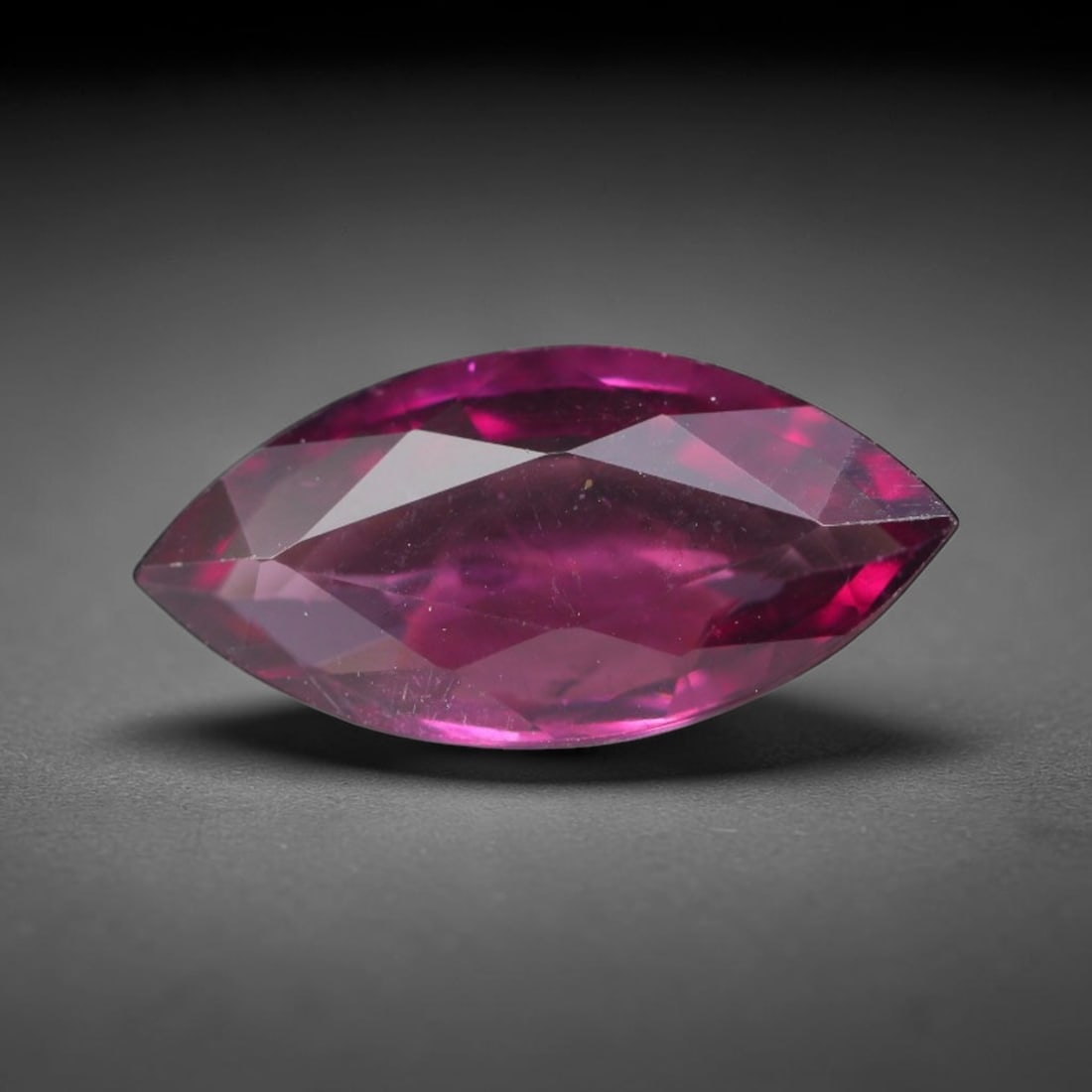 2.03ct Natural Tanzanian Rhodolite Grape Garnet Faceted Loose Gemstone, 78BA: This expertly faceted grape garnet, a scarce saturated purple-magenta rhodolite variant, features transparent crystal structure dotted with faint microscopic mineral specks within its precisely cut re