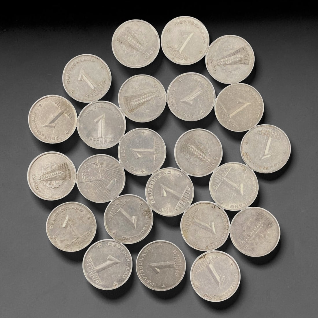 GERMANY: Post-War Recovery - 1 Pfennig Bulk Coin Lot, 14V: This bulk lot of German 1 Pfennig coins, minted in the immediate post-WWII era, is defined by its symbolic wheat sheaf motif-a tribute to agricultural renewal and economic rebuilding. Struck in lightw