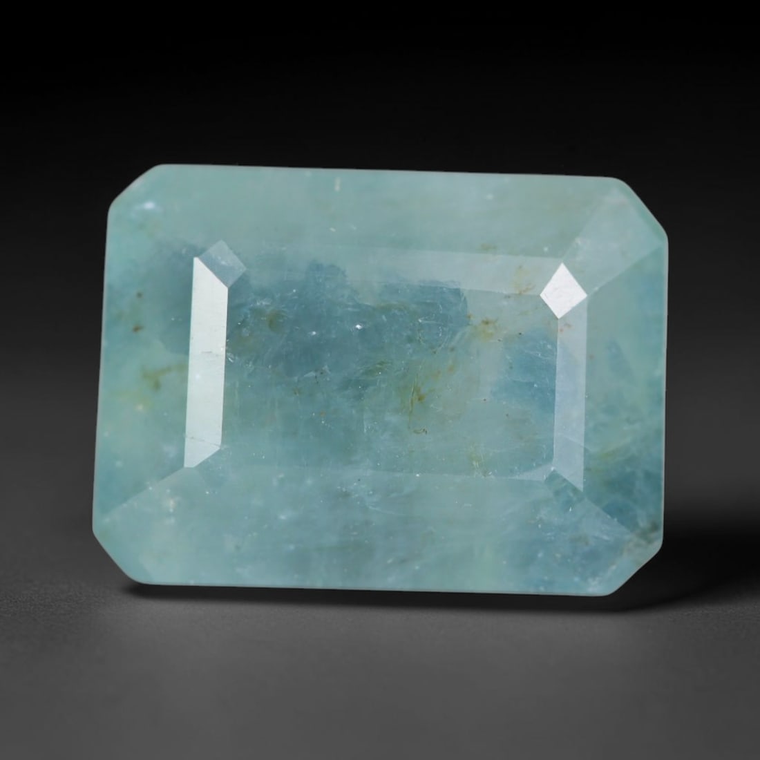 5.79ct Natural Madagascan Faceted Grandidierite Rare Loose Gemstone, 26AS: This expertly faceted finished grandidierite holds soft translucent body tone with fine faint natural internal veining visible beneath precisely cut reflective facets within its 12.7x9.3x5.5mm calibra
