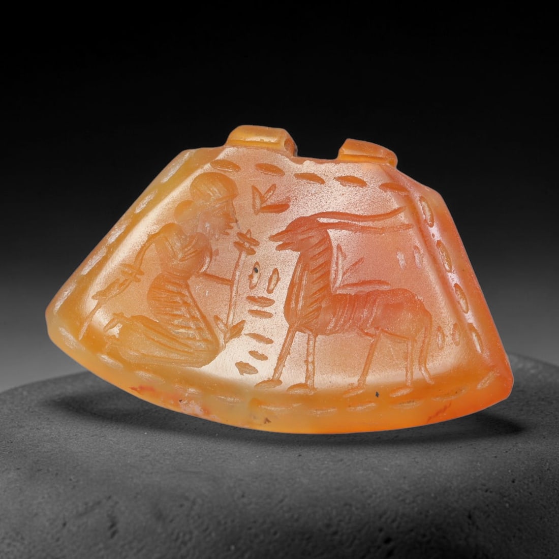 Vintage Natural Carnelian Agate Revival Indo-Persian Glyptic Figural Talisman Amulet Plaque, 39FK: This vintage talisman pendant plaque is skillfully carved from natural banded carnelian agate, crafted in a style referencing ancient Indo-Persian glyptic art traditions. The face bears detailed relie
