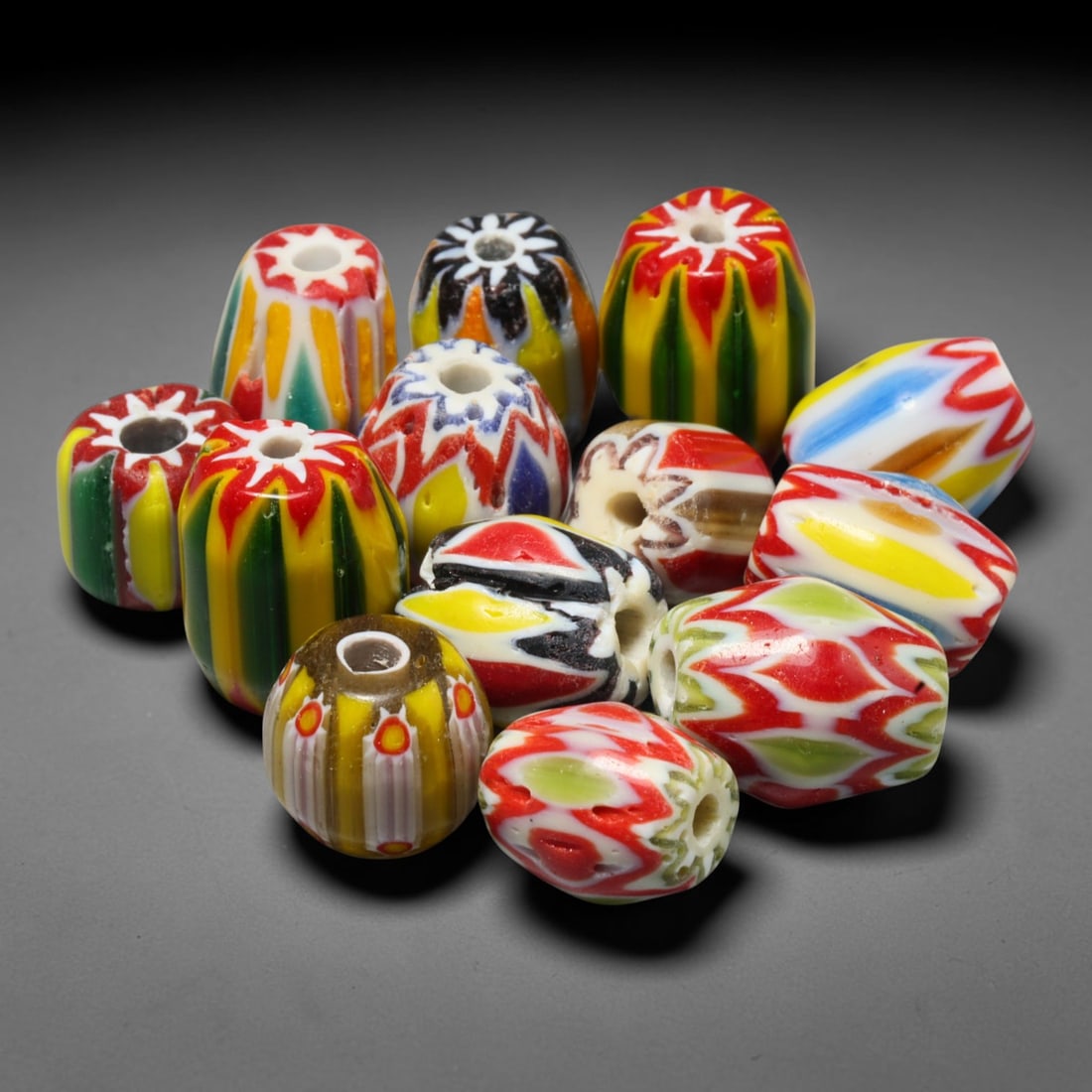 Vintage Chevron Glass Trade Bead Parcel Lot, 8EG: Vintage chevron glass bead collection, well-preserved with characteristic aged glass surface texture. Largest bead measures 15x11mm, suitable for jewellery assembly, collection and antique bead tradin