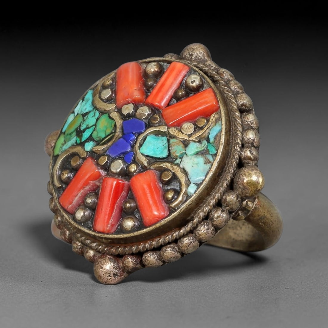 Vintage Tibetan Tribal Silver Plated Gemstone Inlay Ring, US Size 9, 93BY: Vintage Tibetan constructed ring with silver plated metal framework. The face features carefully set natural mineral inlays surrounded by detailed traditional metal ornamentation and textured border d