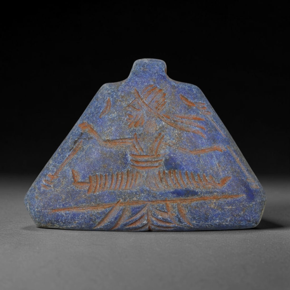Ancient Sasanian Lapis Lazuli Hand Carved Amulet, 74AP: Antique wearable protective amulet fully carved from solid natural lapis lazuli stone, originating from the historic Sasanian Empire cultural sphere. Lapis lazuli was an immensely valued sacred stone 