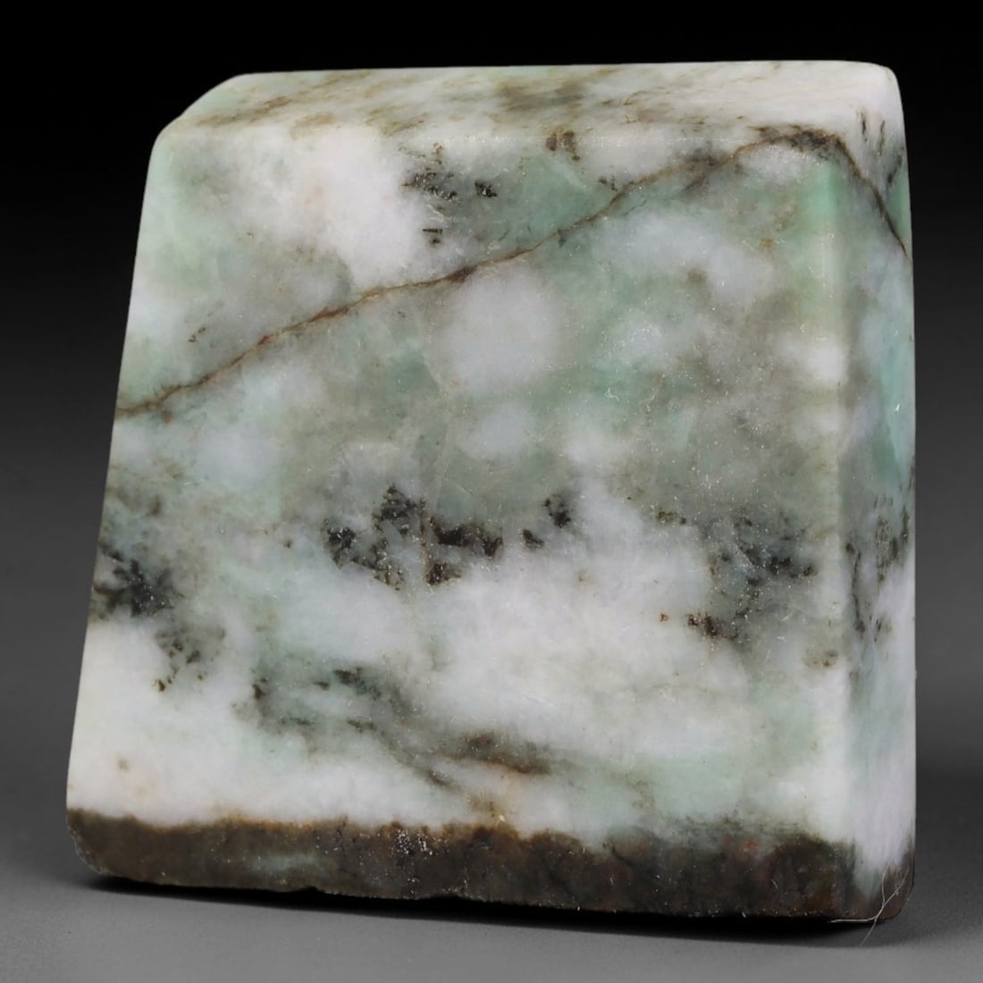 290ct Natural Type A Burmese Jadeite Jade Sliced Rough, 58FB: This specimen is a sliced rough block of natural Type A Burmese jadeite jade. The interior displays natural colour zoning with visible mineral veining and crystalline patterns typical of unprocessed j