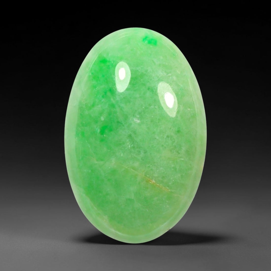 4.02ct Natural Burmese Type A Apple Green Jadeite Jade Cabochon, 94BP: This single loose natural Burmese Type A jadeite jade cabochon with exact dimensions of 15.1x10x3.2mm. It is completely untreated, free of artificial dye, bleaching, or resin filling, preserving the o