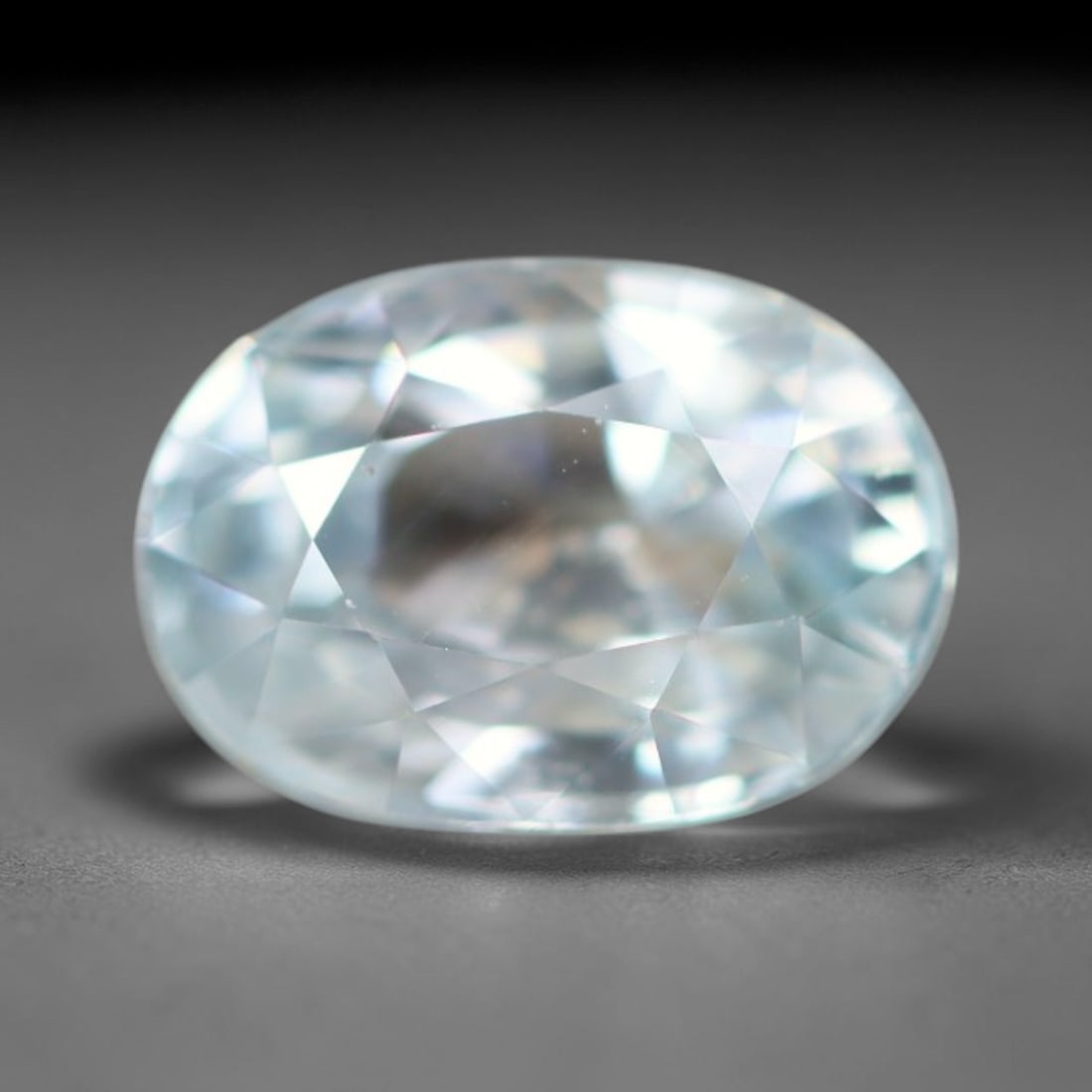 1.32ct Natural Cambodian Sky Blue Blue Zircon Loose Gemstone, 17BA: This fully polished blue zircon carries a gentle pale sky blue body tone with tiny microscopic mineral specks dispersed within its high-dispersion crystal interior, measured at calibrated dimensions o