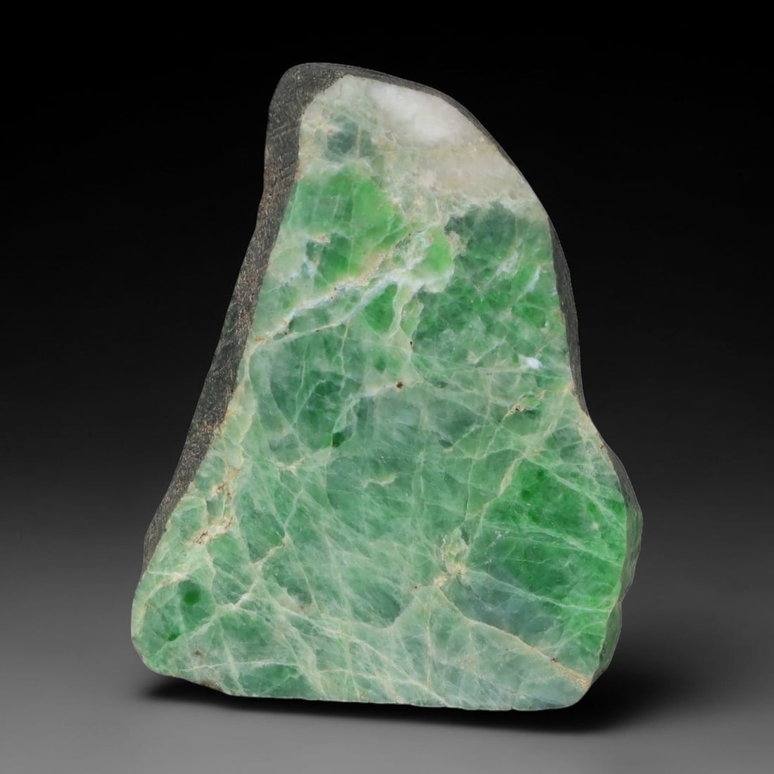 175ct Natural Type A Burmese Jadeite Jade Sliced Rough, 97AY: This specimen is a sliced rough block of natural Type A Burmese jadeite jade. The interior displays natural colour zoning with visible mineral veining and crystalline patterns typical of unprocessed j