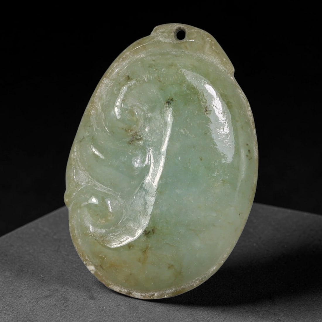 Natural Vintage Burmese Type A Jadeite Jade Ruyi Swirl Relief Pendant, 57AA: Hand-carved vintage pendant crafted from untreated natural Burmese Type A jadeite jade, measuring 3cm x 2.1cm. The smooth oval jade plaque features soft relief carved traditional ruyi spiral swirl mot