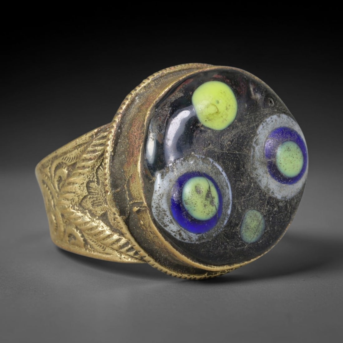 Antique Islamic Millefiori Evil Eye Glass Cabochon Set Vintage Signet Ring (1700-1900 CE), 64AM: The primary collectible value resides within the inset antique millefiori evil-eye glass cabochon, authentic genuine antique glass (distinguished from earlier ancient glass and modern vintage glass) c