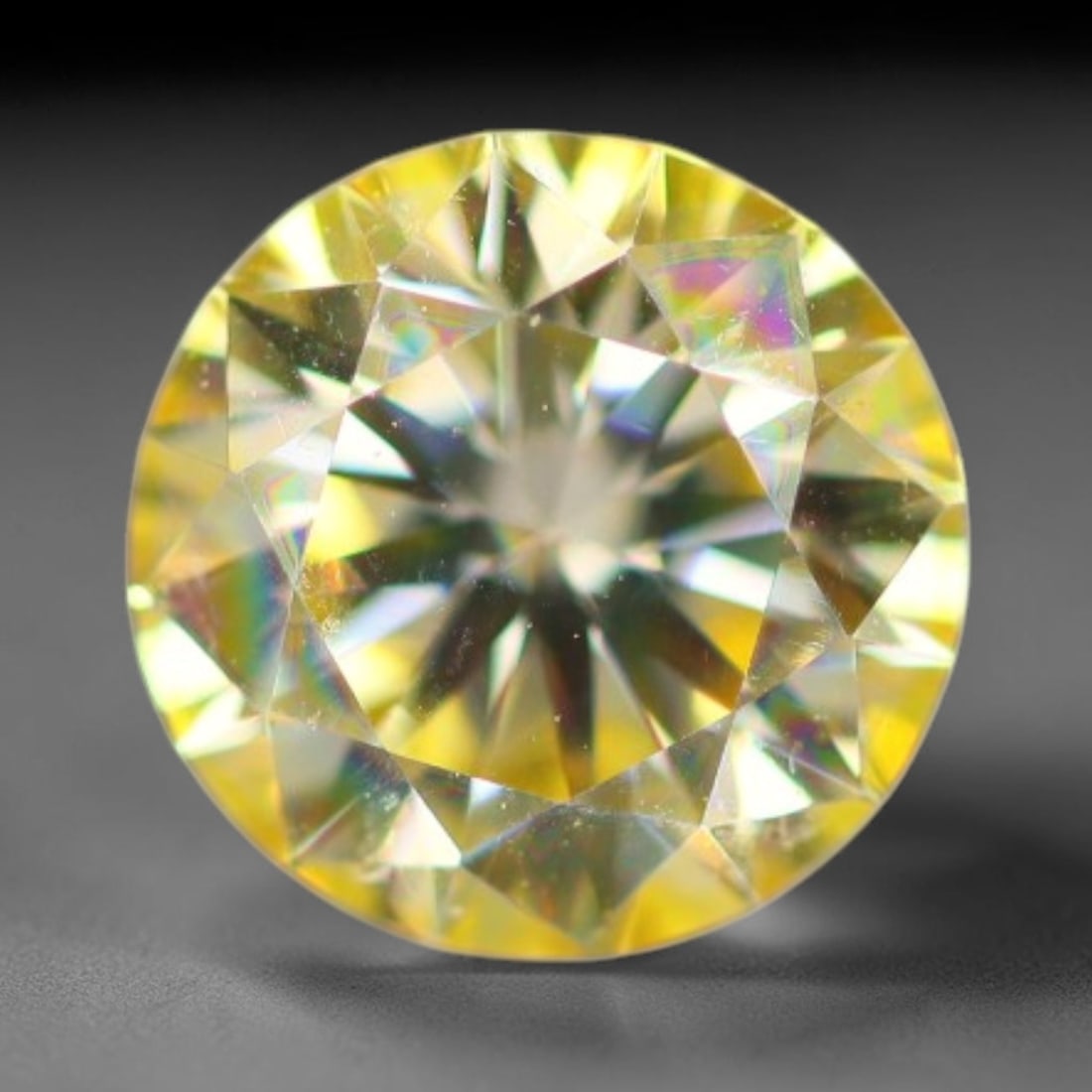 0.93 Carats Natural Golden Yellow Moissanite Loose Gemstone, 97FM: This golden yellow moissanite features dimensional measurements of 6.4x3.9mm, lab-crafted silicon carbide boasting extraordinary refractive power that produces intense, multi-tonal rainbow brilliance 